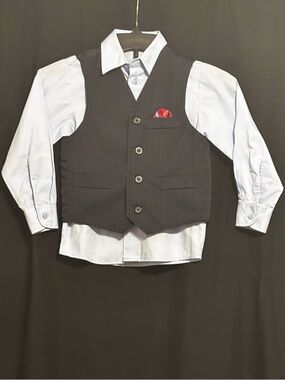 George Light Blue Dress Shirt with Black vest & red handkerchief.